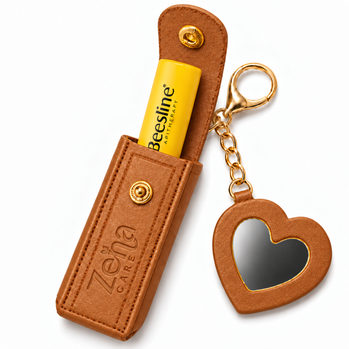 ZeinaCare brown lip pouch with yellow Beesline lip balm partially pulled out and matching heart mirror.